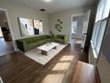 Inviting living room with hardwood floors, stylish decor, and abundant natural light at 1929 Hazelwood Se Dr, Marietta, GA 30067