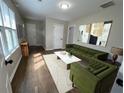 Bright living room features hardwood floors, modern decor, and comfortable seating arrangements at 1929 Hazelwood Se Dr, Marietta, GA 30067