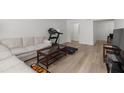 Bright living room offering ample space, neutral décor, and modern flooring for a stylish and functional area at 6851 Roswell Rd # L1, Atlanta, GA 30328