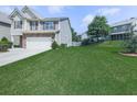 Spacious backyard featuring lush green grass and mature trees, perfect for outdoor activities and relaxation at 212 Torch Dr, Acworth, GA 30102