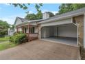 Attached two-car garage with an open door, providing ample parking space at 1240 Rocky Rd, Lawrenceville, GA 30044