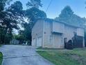 Charming two-story home with a two-car garage, and a shed in backyard at 4007 Stacy Ln, Snellville, GA 30039