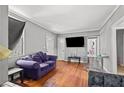 Bright living room showcasing hardwood floors and ample space for comfortable living at 1324 Almont Sw Dr, Atlanta, GA 30310