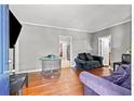 Cozy living room featuring hardwood floors and neutral walls, ready for personalization at 1324 Almont Sw Dr, Atlanta, GA 30310