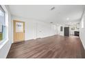 This spacious living room has beautiful floors and is flooded with lots of natural light at 1 Lamar Ave Sw, Atlanta, GA 30310