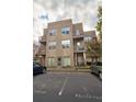Modern condo building featuring balconies and reserved parking spaces for residents at 238 Walker Sw St # 32, Atlanta, GA 30313