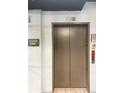 Elevator and signage in lobby at 425 Chapel Sw St # 1206, Atlanta, GA 30313