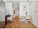Modern entryway features sleek desk, wood floors, and contemporary decor at 44 Peachtree Nw Pl # 1828, Atlanta, GA 30309