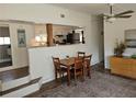 Charming dining area with table and chairs, open to the kitchen, perfect for entertaining and everyday meals at 5440 Portside Dr, Acworth, GA 30101