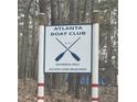 Atlanta Boat Club sign in a wooded area at 5440 Portside Dr, Acworth, GA 30101