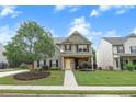Beautiful two-story home with a well-kept lawn and inviting walkway under a blue sky at 236 Creek View Ln, Acworth, GA 30102