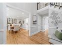 Bright foyer with hardwood floors, high ceilings, and an open view to the dining area at 4754 Township Chase, Marietta, GA 30066