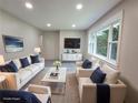 Living room with contemporary furniture and decor, creating a welcoming and stylish space at 2926 Monterey Dr, Decatur, GA 30032