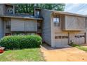 Charming townhouse with two-car garage and well-maintained landscaping at 1002 Creatwood Se Cir, Smyrna, GA 30080