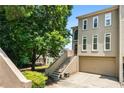 Charming home with a two-car garage and appealing architectural details at 2556 Oakwood Se Trce, Smyrna, GA 30080