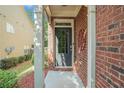 Welcoming front entrance with a stylish door and decorative brick accents at 49 Braemore Mill Dr, Lawrenceville, GA 30044