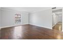 Spacious living room with hardwood floors and a large window at 3187 Abbeywood Dr, Decatur, GA 30034