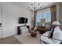 Inviting living room with lots of natural light, hardwood floors, and elegant furnishings at 962 Bibbs Circle Nw # 7, Atlanta, GA 30318
