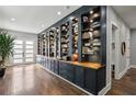 Stylish entryway with custom cabinets and hardwood floors at 2020 Bixby Se St, Atlanta, GA 30317