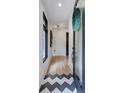 Inviting entryway featuring stylish tile flooring and a modern front door with a glass panel at 3960 Clairmont Rd # 2, Chamblee, GA 30341
