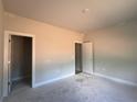 Light-filled bedroom with freshly painted walls and trim, offering a blank canvas at 5381 Tuscany Dr, Douglasville, GA 30135