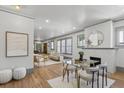 Bright, open living and dining space featuring hardwood floors, large windows, and stylish decor at 531 Atlanta Se Ave, Atlanta, GA 30315