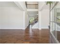 Spacious foyer with high ceilings, hardwood floors, and an open staircase creates a grand entrance at 5340 Candun Cir, Sugar Hill, GA 30518