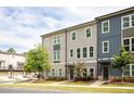 Townhome showcases colorful exterior, well-maintained landscaping, and charming curb appeal at 1190 Buice Lake Pkwy, Acworth, GA 30102