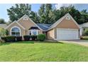 Charming home with a well-manicured lawn, and two-car garage at 3625 Ennfield Lane Ln, Duluth, GA 30096