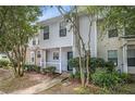 Neat townhome with mature trees and a tidy front yard at 2376 Wellington Cir, Lithonia, GA 30058