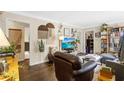 Inviting living room with hardwood floors, neutral walls, stylish decor, and comfortable seating at 1091 Napier St, Atlanta, GA 30316
