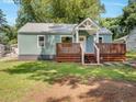 Charming home featuring a stylish deck, a well-maintained lawn, and a cozy, inviting exterior at 2197 Jernigan Dr, Atlanta, GA 30315