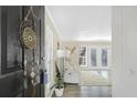 Bright living room featuring hardwood floors and access to patio doors at 4018 Bayside Cir, Atlanta, GA 30340