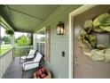 Inviting front porch with seating, perfect for relaxing and enjoying the outdoors at 427 Pleasant Way, Temple, GA 30179