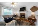 Bright living room with a fireplace, offering a comfortable and stylish space at 427 Pleasant Way, Temple, GA 30179