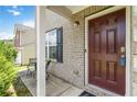Inviting front porch with a stylish door and a cozy seating area at 5622 Laurel Ridge Dr, Atlanta, GA 30344