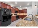 Kitchen featuring stainless steel appliances, granite countertops, and abundant cabinet storage at 124 Freedom Dr, Acworth, GA 30102