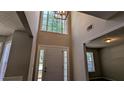 Bright entryway featuring a tall ceiling and large windows for lots of natural light at 2565 Rainmaker Dr, Decatur, GA 30034