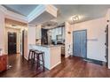Inviting living area with hardwood floors, breakfast bar and a neutral color palette at 955 Juniper Ne St # 4127, Atlanta, GA 30309