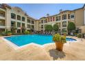 Inviting community pool with lounge chairs surrounded by manicured landscaping at 955 Juniper Ne St # 4127, Atlanta, GA 30309