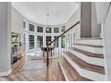 This home features a dining room, beautiful bay windows, and stairway at 3860 Overlake Dr, Cumming, GA 30041
