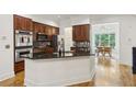 Modern kitchen features stainless steel appliances and granite countertops at 2442 Crescent Park Ct, Atlanta, GA 30339