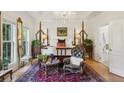 Luxurious main bedroom with a chandelier and elegant furnishings at 2442 Crescent Park Ct, Atlanta, GA 30339