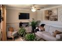 Comfortable living room with modern decor, a plush sofa, and ample natural light at 1625 Conley Rd # 229, Conley, GA 30288