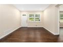 Inviting living room boasts hardwood floors, fresh paint, and ample natural light at 1975 Glenmar Dr, Decatur, GA 30032