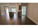 Open-concept living area with hardwood floors and a view of the kitchen at 3908 Shelleydale Dr # 39, Powder Springs, GA 30127