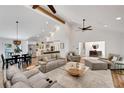 Spacious living room with vaulted ceilings, wooden beams, and an open layout at 1519 Biddle Ct, Dunwoody, GA 30338