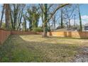 Large backyard space, surrounded by a wooden fence, offering privacy and space for outdoor activities at 1740 S Gordon Sw St, Atlanta, GA 30310
