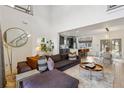 Open floor plan living space with views to the kitchen and dining area, hardwood floors, and modern decor at 1740 S Gordon Sw St, Atlanta, GA 30310