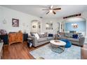 Comfortable living room with hardwood floors and an archway to the dining room at 971 Brownstone Ln # 18, Marietta, GA 30008